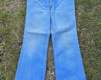 W32 L31 Jeans vintage Levi’s con etichetta arancione, lavaggio chiaro, modello bootcut a zampa d'elefante, modello Talon.