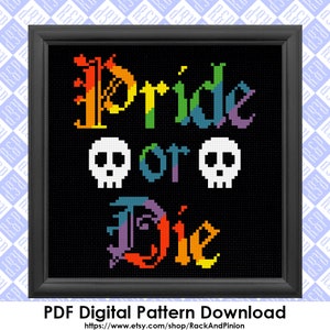 May include: A cross-stitch pattern featuring the phrase "Pride or Die" in rainbow colors with two skull images. The pattern is framed in black and has a white background.