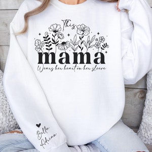 Personalized Mom Sweatshirt With Kids Names, Cute Momma Outfit, Mothers Day Gifts, Custom This Mama Wears Her Heart On Her Sleeve Hoodie