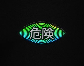 Holo-Alert Eye Sticker: Futuristic Holographic Decal for Laptops & Tech Gear | Cyber Eye with Hypnotic Pattern