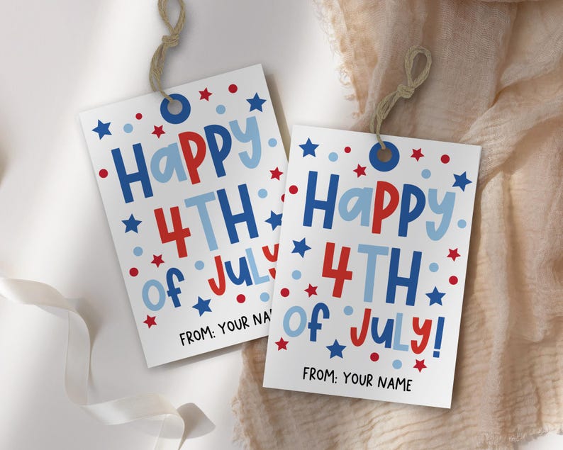 Flat lay of patriotic printable tag with “Happy 4th of July!” greeting, ready to print for party or picnic gifts, editable name field included