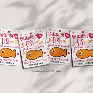Fish valentine gift tag printable styled with modern, playful typography in pink and brown, cartoon fish graphic, and heart confetti, created to be printed on cardstock, cut out, and clipped to kraft lunch bags or treat sacks for children, classmates, and friends.