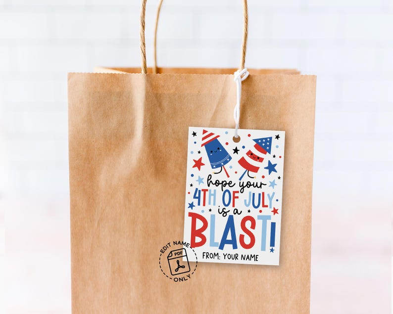 Flat lay of printable tag with fun fireworks and stars in red, white and blue, perfect for adding to 4th of July treat bags and holiday gifts