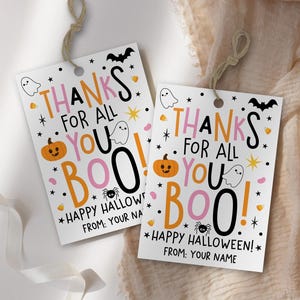 “Thanks for All You Boo!” Halloween gift tag with “Happy Halloween!” below, using pink, orange, and black lettering surrounded by playful spooky illustrations.