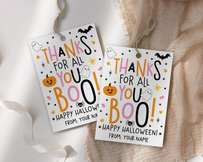 “Thanks for All You Boo!” Halloween gift tag with “Happy Halloween!” below, using pink, orange, and black lettering surrounded by playful spooky illustrations.