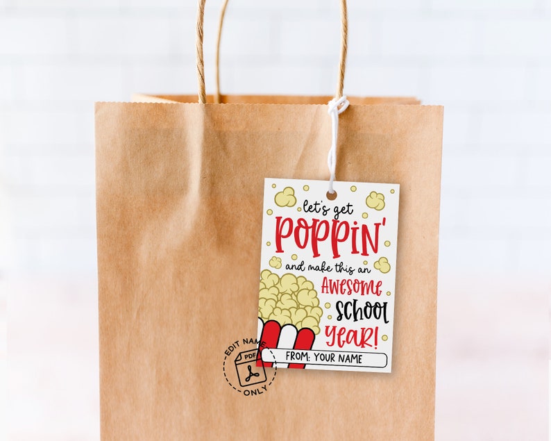 School year welcome tag printable with fun popcorn design and playful red yellow black text, ideal for attaching to snack bags or popcorn packs for first day