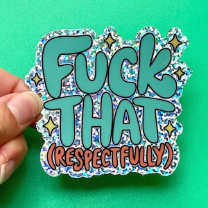 May include: A glittery sticker with a silver holographic finish featuring the teal text FUCK THAT and the peach-colored text (RESPECTFULLY) below it. The design includes small yellow four-pointed star accents on a die-cut, irregular shape.
