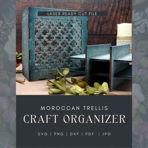May include: A teal-colored wooden craft organizer with a Moroccan trellis design. The organizer has multiple shelves and a large, decorative front panel. The text "LASER READY CUT FILE" is at the top, and "MOROCCAN TRELLIS CRAFT ORGANIZER" is at the bottom.