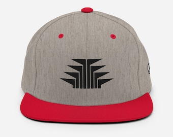 May include: A gray and red baseball cap with a black geometric design on the front.