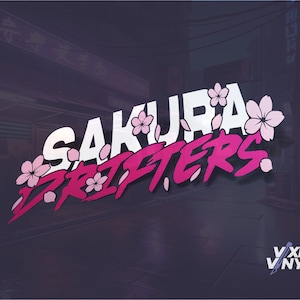 May include: Pink and white vinyl decal with the text "Sakura Drifters" and pink cherry blossoms. The decal is on a dark background with a blurred image of a city street in the background. The text "Vixen Vinyls" is in the bottom right corner.