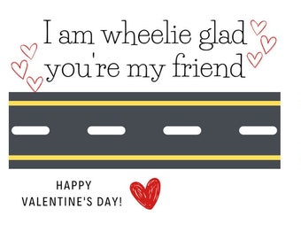 May include: Four printable Valentine's Day cards featuring a road with yellow lines and the text "I am wheelie glad you're my friend". Each card also includes the text "Happy Valentine's Day!" and a red heart.