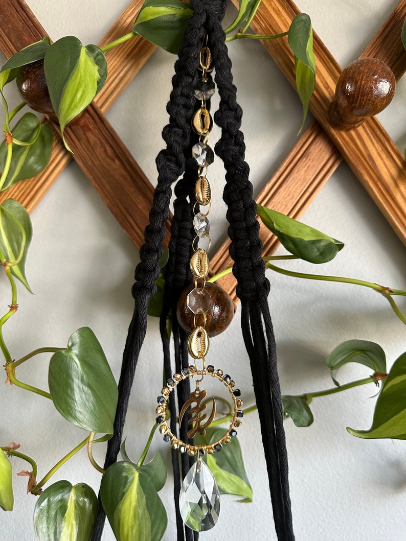 Black macrame plant hanger with suncatcher crystal gold cowrie shells and adinkra symbol gye nyame image 3