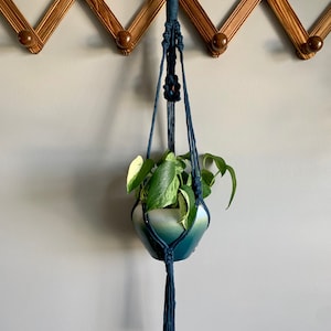 Peacock blue Macrame plant hanger with peacock ore stone crystal