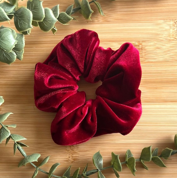A Deep Red Velvet Scrunchie Hair Accessory