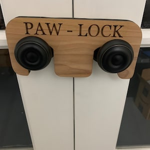 Paw-Lock - to keep those pesky animals from opening the interior French doors