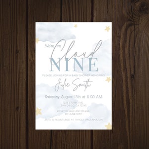 May include: A baby shower invitation with a blue watercolor background and gold stars. The text reads "We're on Cloud NINE" and "Please join us for a baby shower honoring Julie Smith". The invitation includes the date, time, address, RSVP information, and registry details.