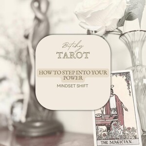 May include: A beige card with the text "Bitchy Tarot" and "How to step into your power, Mindset Shift." A tarot card with a red-robed figure is visible. A white rose and a decorative vase are in the background.