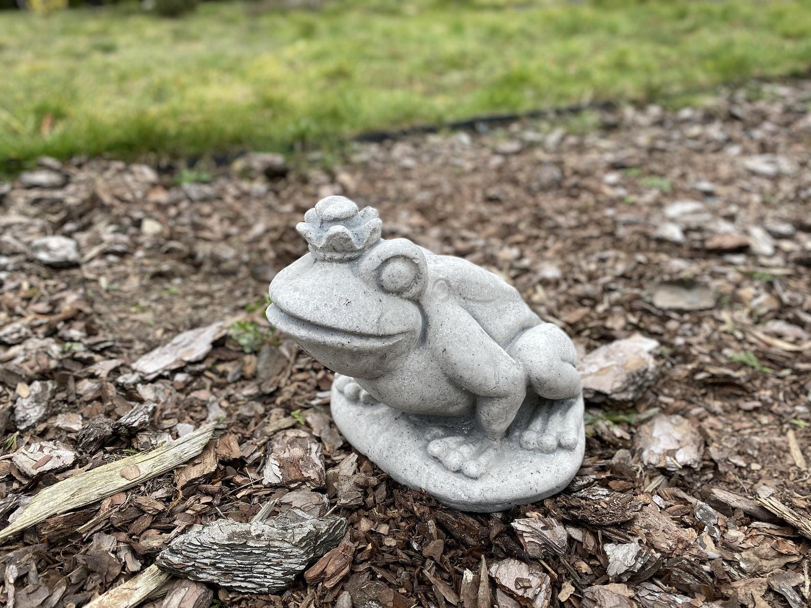 concrete frog statue
