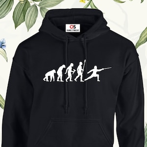 May include: Black hooded sweatshirt with a white graphic of the evolution of man, ending with a fencer holding a foil.