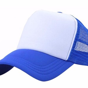 May include: A blue and white trucker hat with a mesh back. The front of the hat is white and the brim and back are blue.