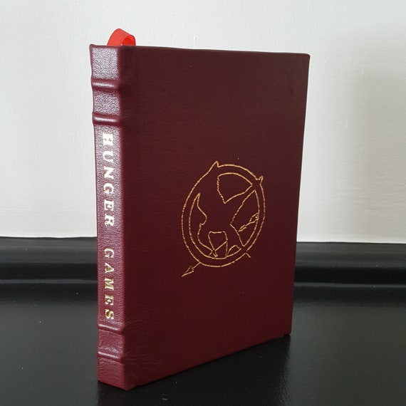The Hunger Games - Suzanne Collins - Relié en cuir fait main - Livre relié  en cuir Premium