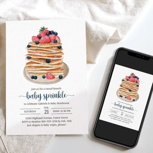 May include: A baby sprinkle invitation featuring a watercolour illustration of a stack of pancakes topped with strawberries and blueberries. The invitation text reads "join us for a casual brunch baby sprinkle to celebrate Gabriela & Baby Henderson. Saturday Feb. 21 10AM-12:30 PM 12345 Highland Avenue, Forest Grove RSVP to Heather 805-555-1234 by Feb. 15th Just diapers & baby wipes, please!"