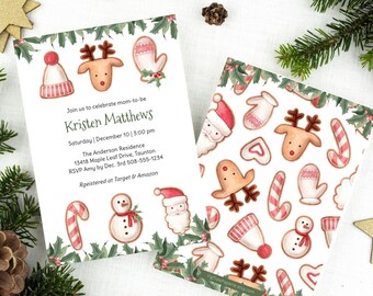 Peut inclure: Une invitation blanche sur le thème de Noël rouge et vert. L'invitation est pour une fête prénatale pour Kristen Matthews. L'invitation représente un bonhomme en pain d'épices, un bonhomme de neige, un renne et un Père Noël. L'invitation comprend également la date, l'heure et le lieu de la fête prénatale.
