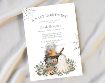 May include: A baby shower invitation with a Halloween theme. The invitation features a cauldron with a ghost and pumpkins, and the text "A Baby is Brewing".