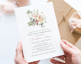 May include: A white invitation card with a floral design and a cross. The text reads: "Please join us as we celebrate the First Holy Communion of our daughter Kathleen Anne. Sunday, May 7, 2022, 10:30 am. St. Peter's Church, 1234 Main Street, Danbury, CT. Lunch immediately following service: The Lobster's Cove, 5678 Shelter Rock Road, Danbury, CT. RSVP Eileen 203-555-7890 by April 20th."