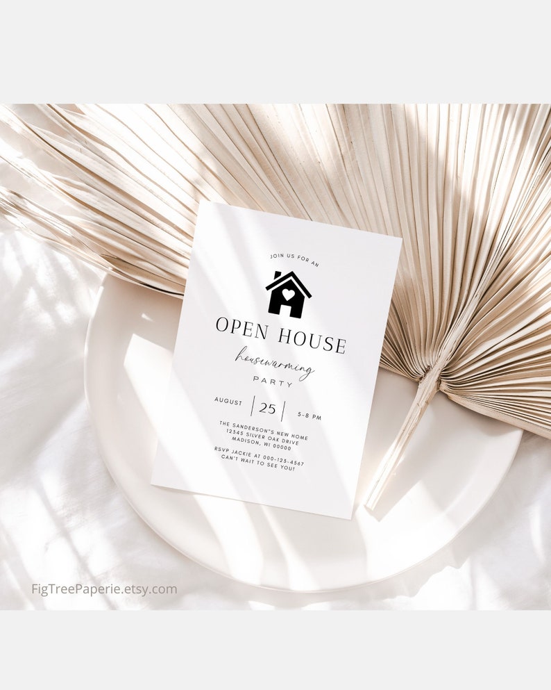 May include: A white card with black text announcing an open house housewarming party on August 25th from 5-8 PM. The address is 12345 Silver Oak Drive, Madison, WI 00000. The RSVP number is 000-123-4567. The card features a black silhouette of a house with a heart in the window.