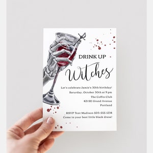 May include: A Halloween party invitation with a skeleton hand holding a glass of red wine. The invitation reads "Drink Up Witches" and includes details for a party at The Coffin Club in Portland, Oregon.