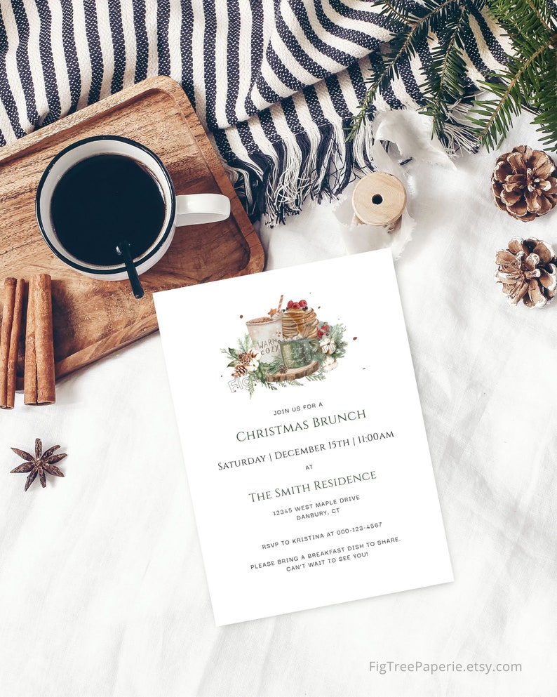 May include: A white invitation card with green and brown watercolor illustrations of a coffee cup, a plate of pancakes, and a sprig of holly. The text on the card reads "Join us for a Christmas Brunch, Saturday | December 15th | 11:00 AM, at The Smith Residence, 12345 West Maple Drive, Danbury, CT, RSVP to Kristina at 000-123-4567, Please bring a breakfast dish to share. Can't wait to see you!"
