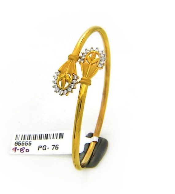 Hallmark gold bangles designs with price deals