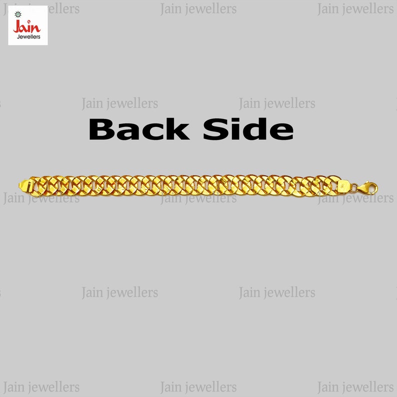 May include: A gold chain bracelet with a thick, textured design. The bracelet is shown from the back side and has a clasp.