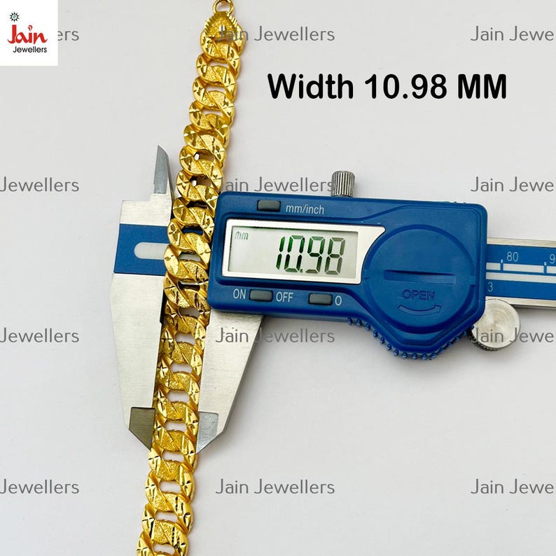 May include: A gold chain bracelet with a textured design, measured with a digital caliper to be 10.98 millimeters wide.