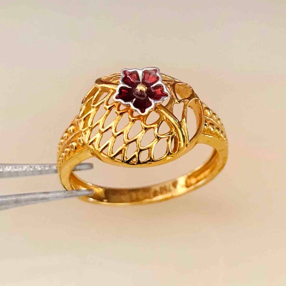 Hallmark gold ring best sale design