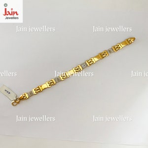 May include: A gold bracelet with a square link design. The bracelet has a polished finish and is decorated with small, clear stones.