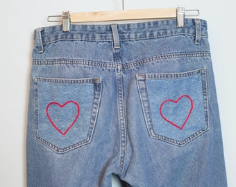 High-waisted jeans Hand embroidered, Jeans trousers with embroidered hearts on the pockets