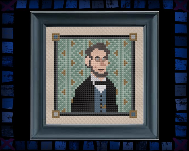 May include: A framed cross-stitch portrait of a man with a mustache and glasses, wearing a dark suit and a light blue shirt with a vest. The background is a green and brown geometric pattern.
