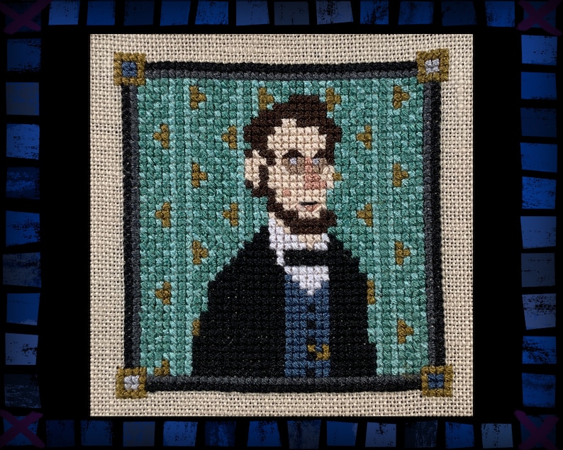 May include: Cross-stitch portrait of Abraham Lincoln in a black suit and blue tie against a green background with gold stars.