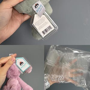 May include: Close-up of a plush toy with a tag from Jellycat London. The tag is white with a teal border and features the Jellycat logo. The toy is a light green colour.