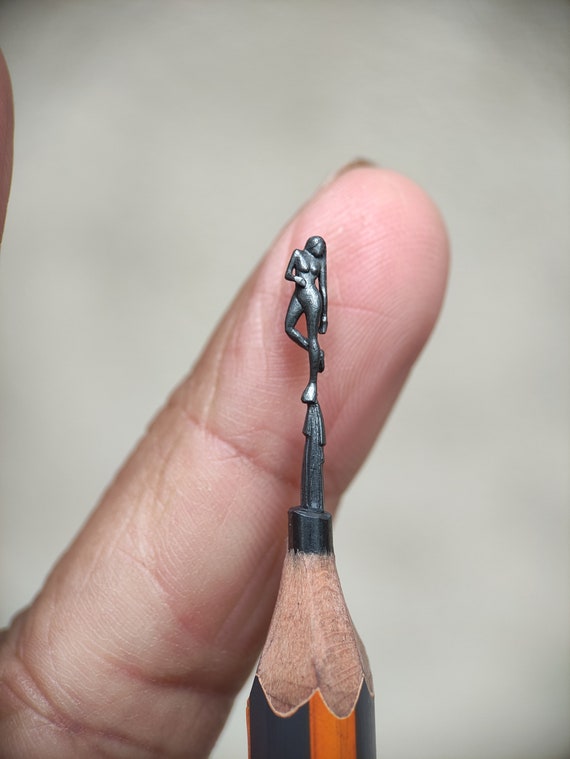 Unique Pencil Carving of Abstract Women Sculpture Pencil