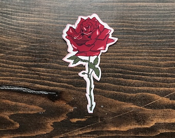 May include: A red rose with green leaves and thorns on a white background.