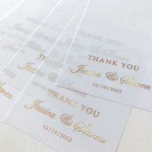 Carte de remerciement de mariage vélin feuille d'or. Semi-transparent, aspect givré avec noms des mariés en feuille d'or, or rose, argent ou noir