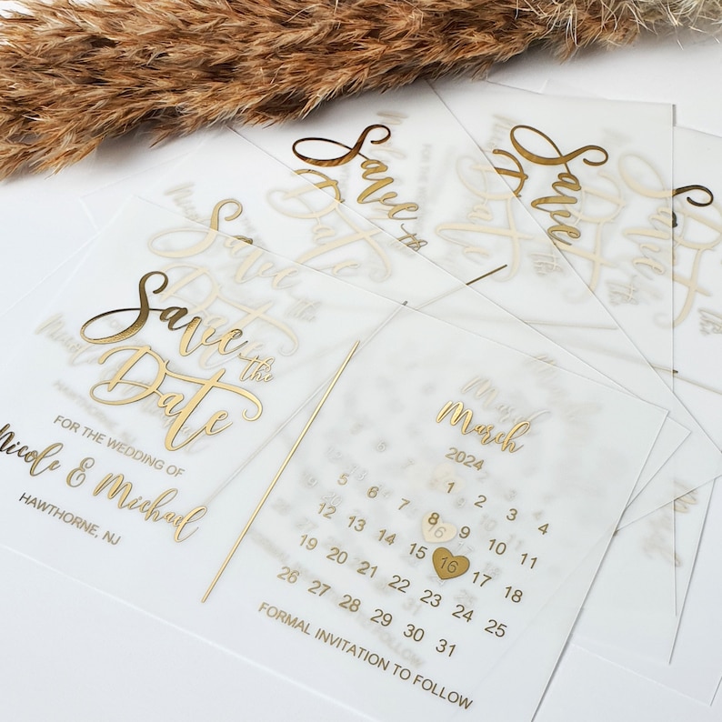 May include: Save the date card with gold foil lettering and a calendar with a gold heart highlighting March 16th, 2024. The card reads "Save the Date" for the wedding of Nicole & Michael, Hawthorne, NJ. Formal invitation to follow.