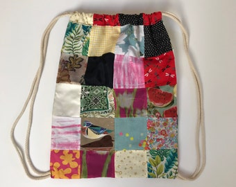 Rugzaktas met trekkoord en patchwork