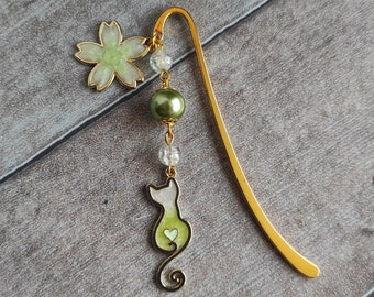 Cat and cherry blossom bookmark, green tint.