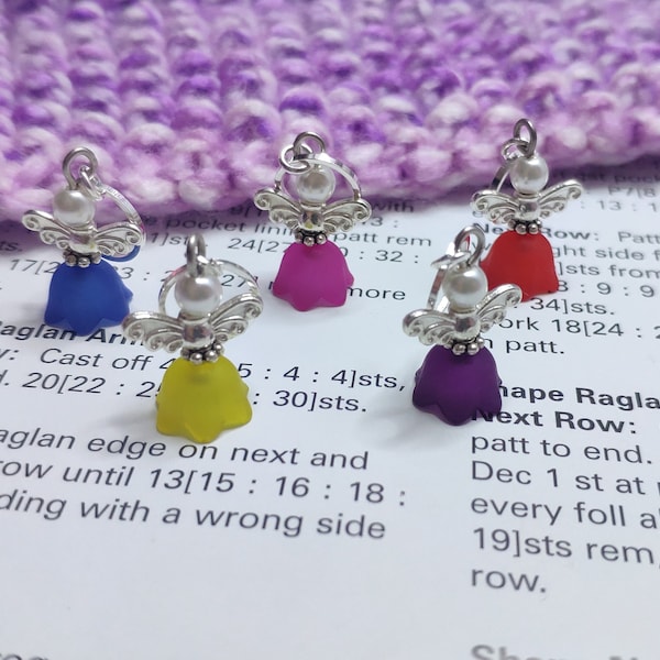 Stitch markers, angel progress keepers for knitting.