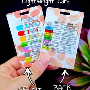 May include: Double-sided lightweight card with blood collection tube color codes and test information. The front displays tube types like sodium citrate and clot activator. The back lists departments and tests, including microbiology and chemistry.