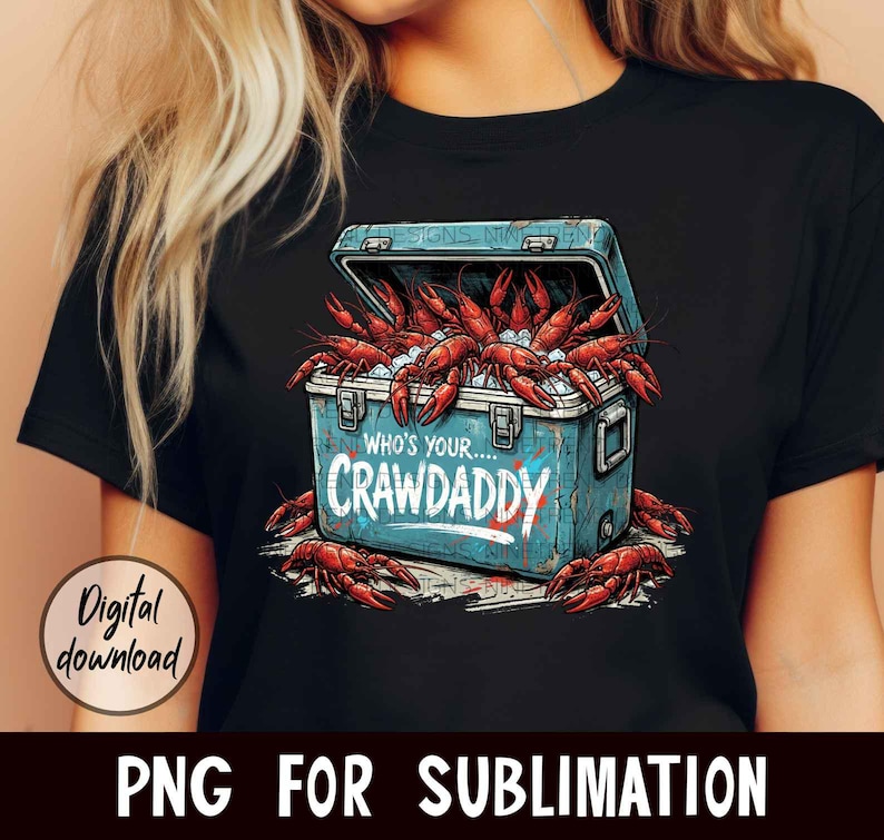 Puede incluir: Camiseta negra con un dise&ntilde;o de nevera azul llena de cangrejos rojos y hielo. El texto "WHO'S YOUR...CRAWADDY" est&aacute; en la nevera. Tambi&eacute;n se ven las palabras "Digital download" y "PNG FOR SUBLIMATION".